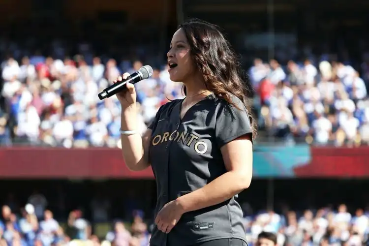 Melissa O'Neil sings the national anthem prior to the 92nd MLB All-Star Game