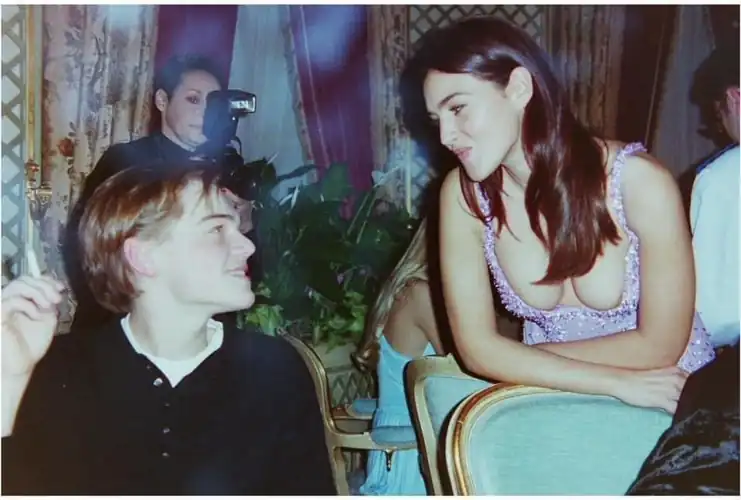 Leonardo DiCaprio and Monica at Versace dinner during Paris Fashion Week, July 1995