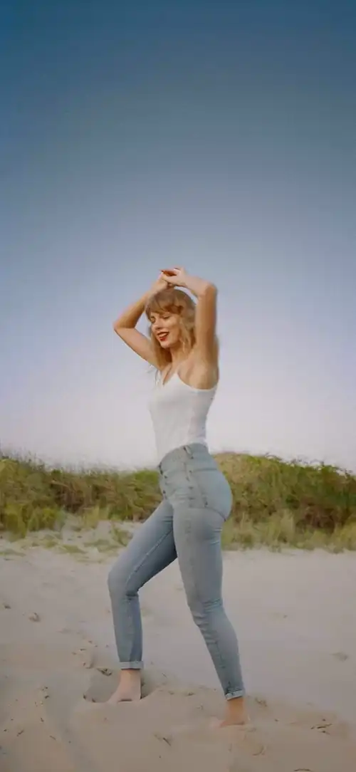 The way her jeans perfectly highlight the perfect shape of her legs and ass