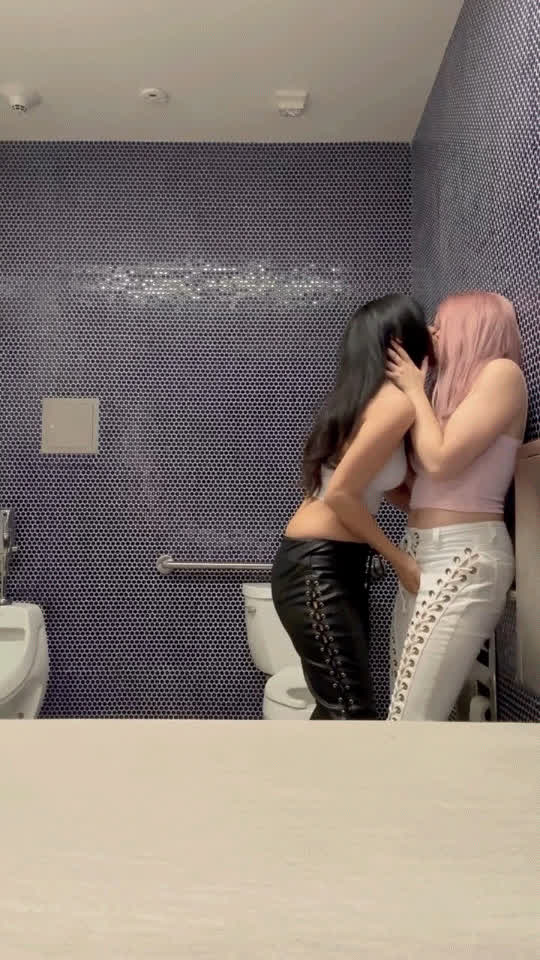 girls making out in public bathroom