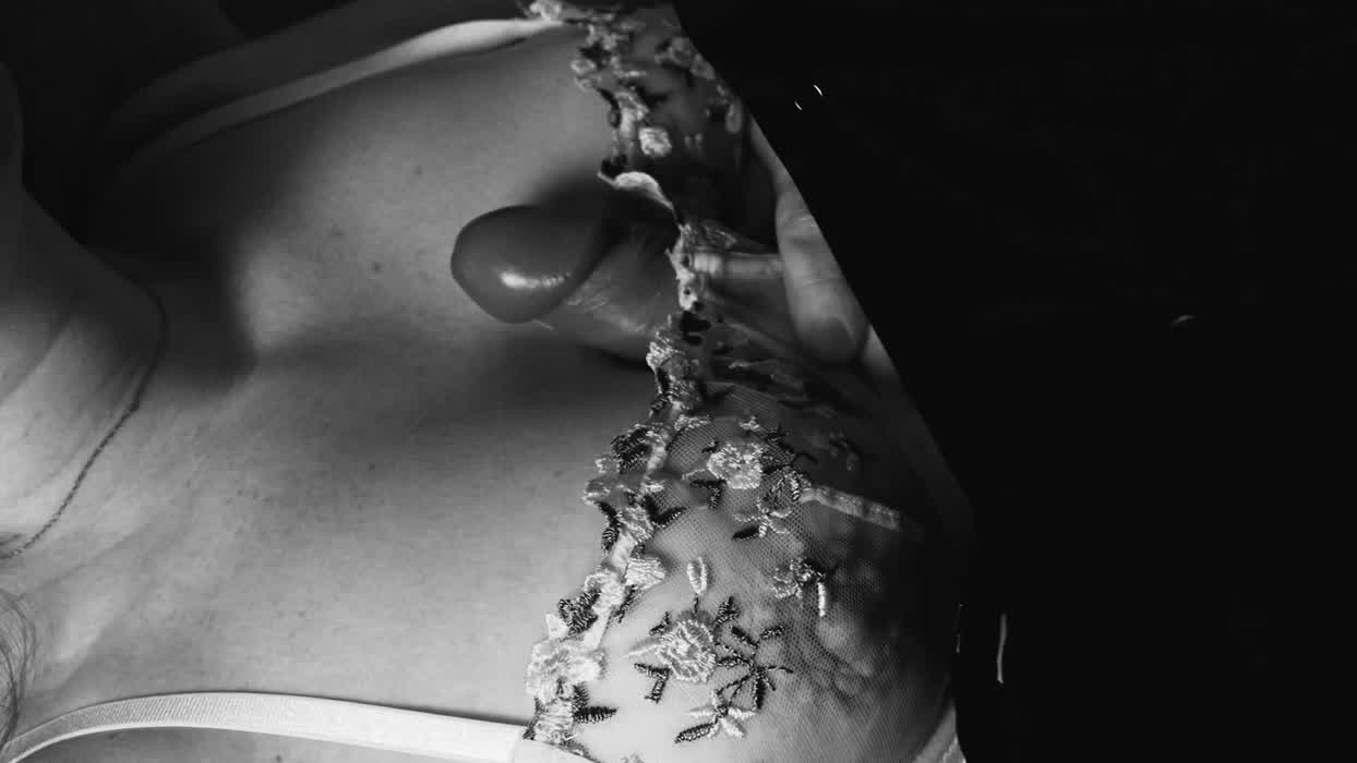 I like to trap my husband’s cock under my bra to ensure that I get all of it on me