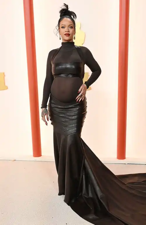 Pregnant Rihanna Stuns in Sheer All-Black Gown Ahead of Her Performance at Oscars 2023