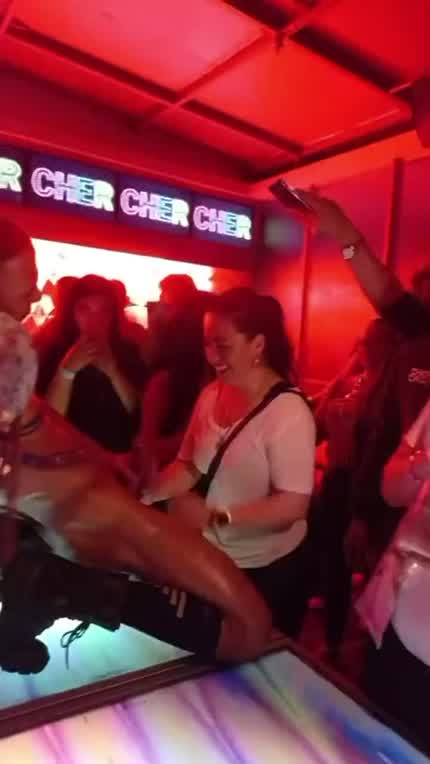 Girl sucks male stripper on stage