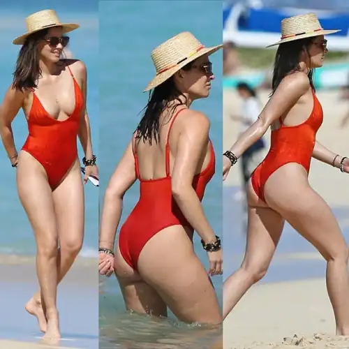 Olivia in a gorgeous one piece swimsuit.
