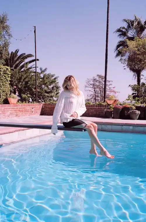 Dipping her toes in the water