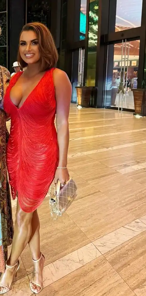 Joy wearing red dress | IG 5/12/24
