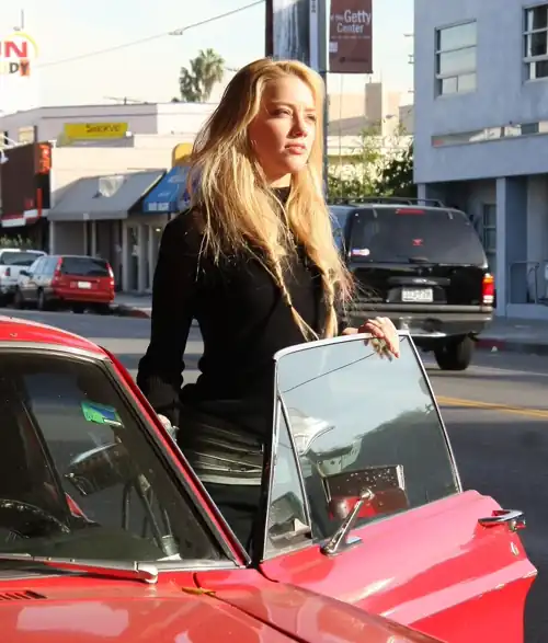 Amber Heard in bright sunshine