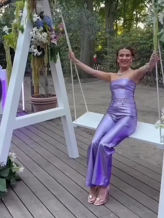 Millie on a swing while at florence by mills event in Berlin | September 2023