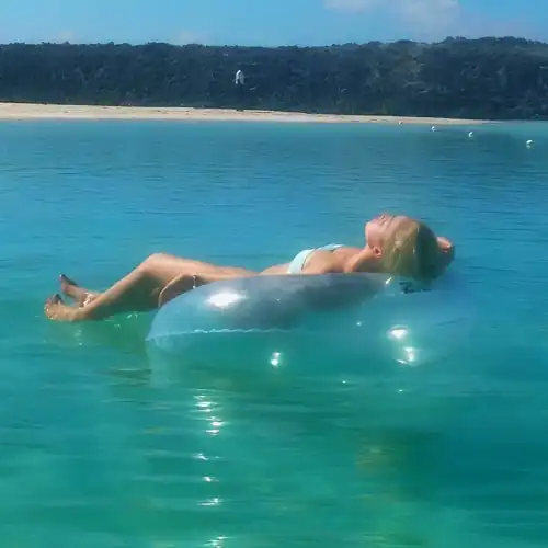 A very rarely seen photo of Peyton in the sea