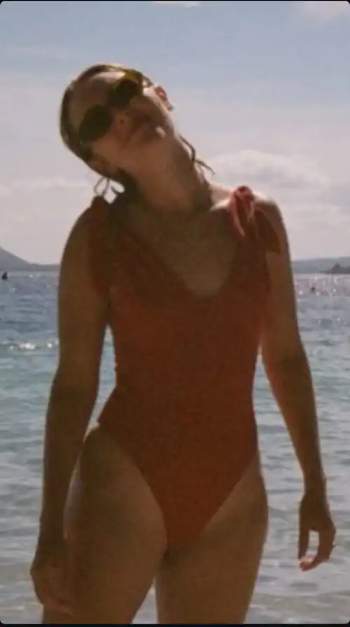 In a one piece swimsuit