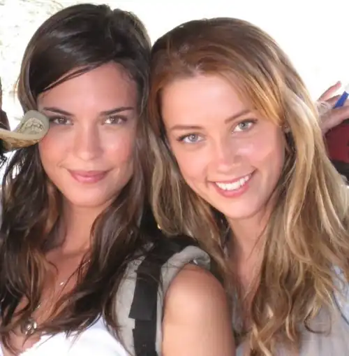 Beautiful smile while posing with a friend
