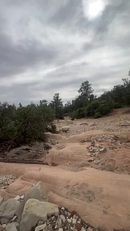 Sprinting naked over sleet rock in the rain