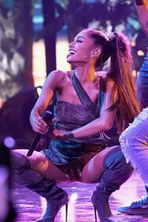 Ariana squatting low