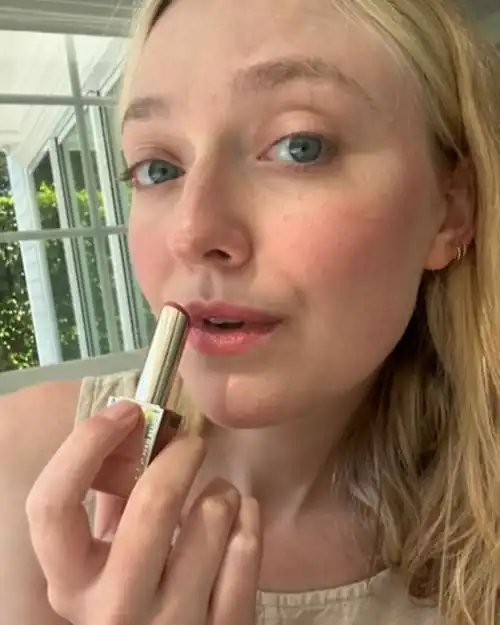 Putting on lipstick 7/29/2024