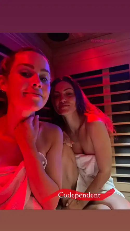Phoebe and Claire Holt in a sauna