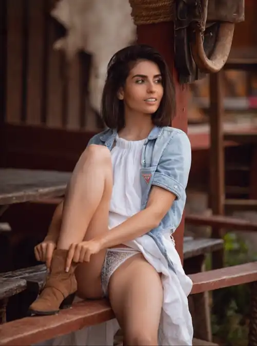 Adjusting her boots