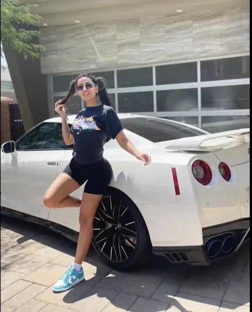 I love her more than the car she is so beautiful and sexy 