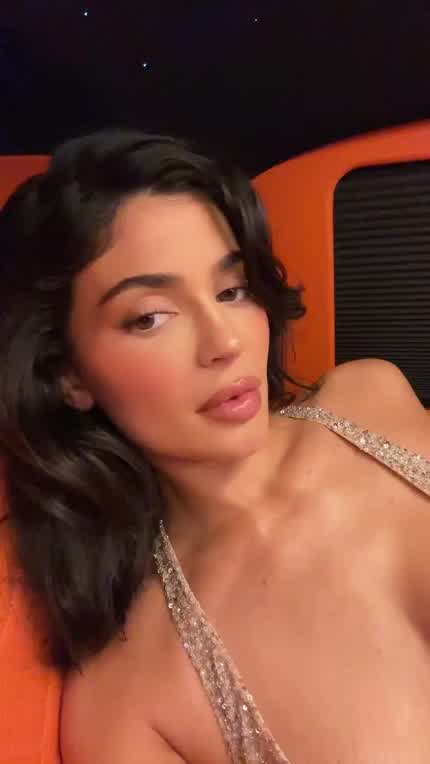 Kylie Jenner showing off her cleavage in the Car | Paris Fashion Week