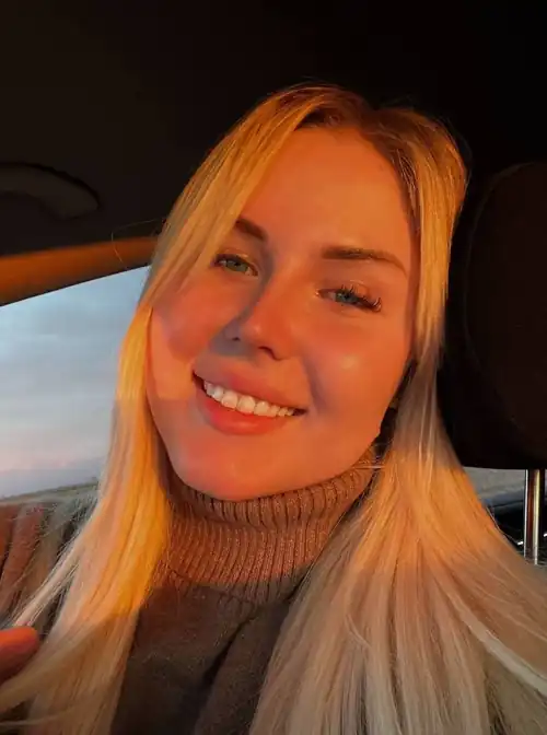 Just a blonde smiling in a selfie :)