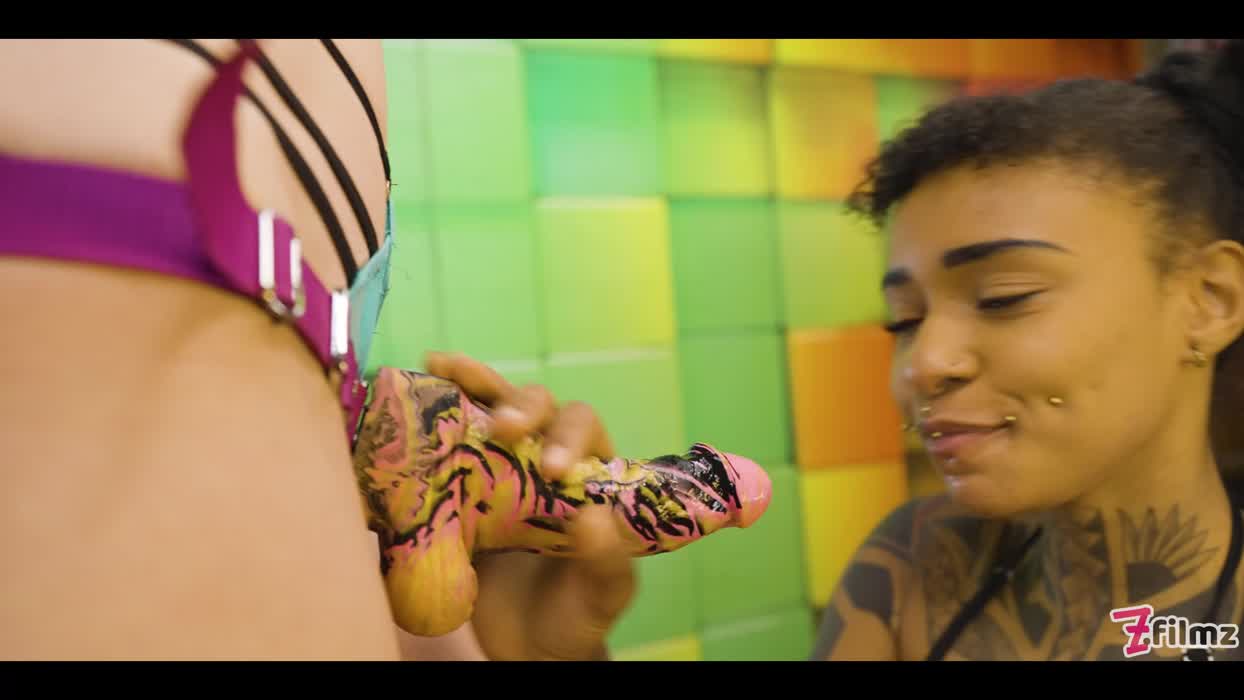 She sucks my strap on nice and deep