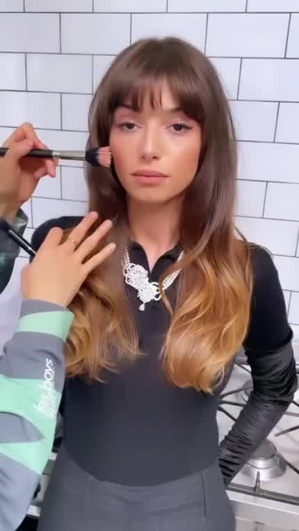 Getting her makeup done 