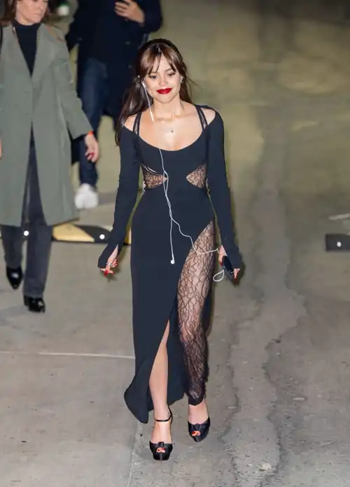 Pretty Jenna With One Fishnet Stocking