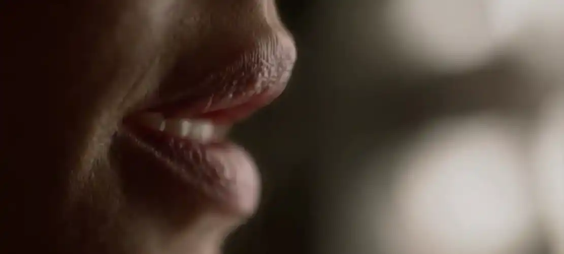 How close from your face would you want her to speak to you?