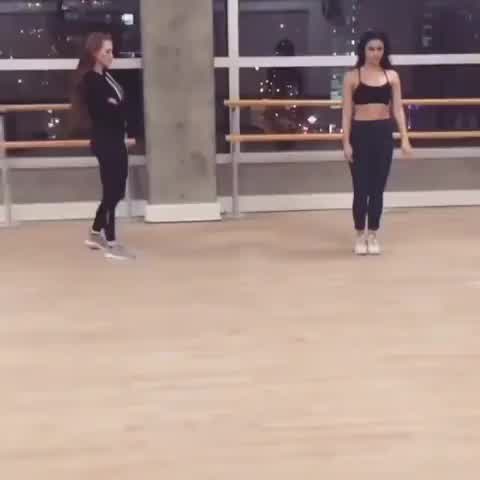 Madelaine and Camila dancing