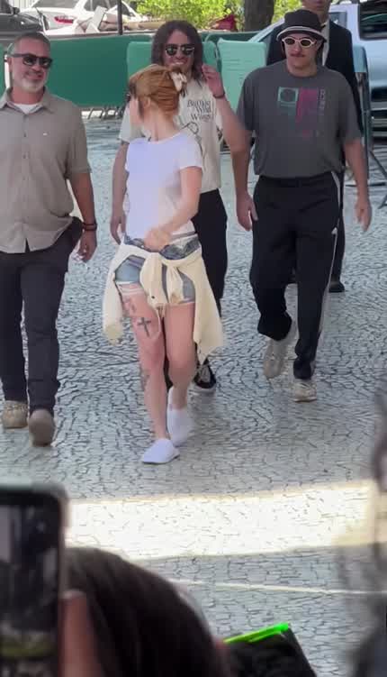 Hayley waving to fans