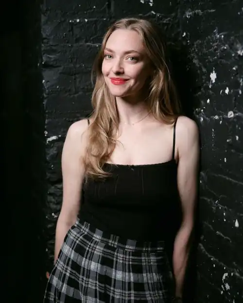 Amanda braless with a plaid skirt
