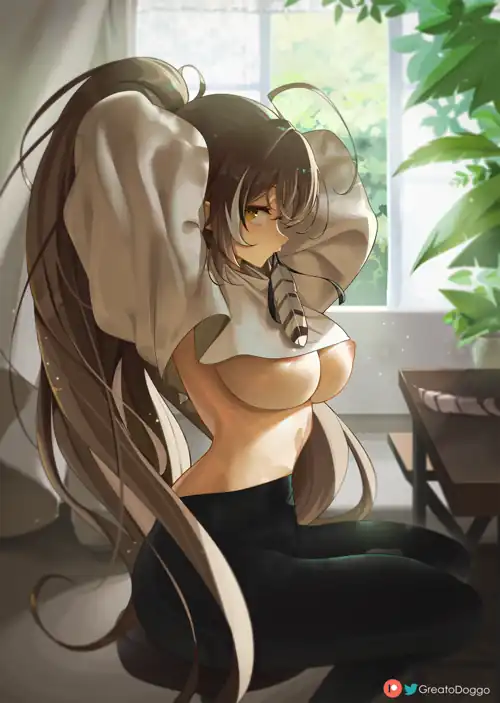 Cutie tying up her hair in the morning.