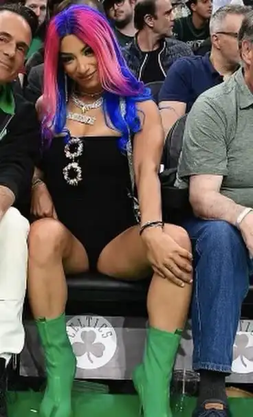 Mercedes courtside at the Celtics game looking like a goddess