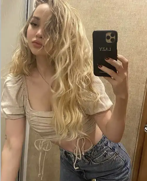 Her curly wet hair looks so beautiful