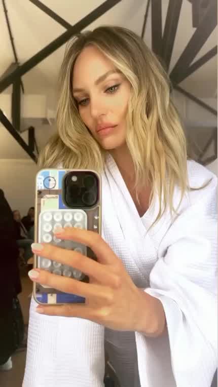 “On the set with the gorgeous Candice Swanepoel”