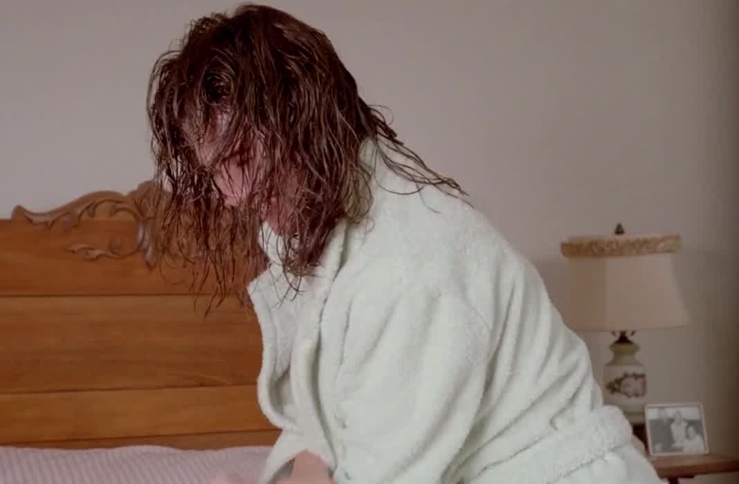 [Topless] Stacy Haiduk, “Luther the Geek” (1989)