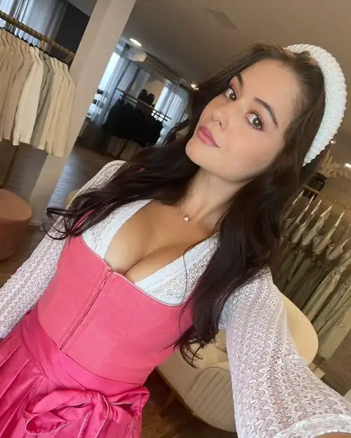 Pink dirndl with hot cleavage