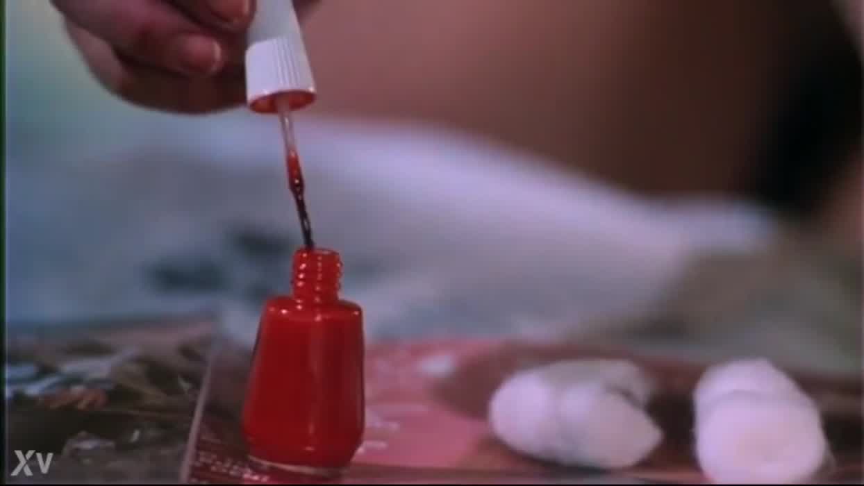 80s horror movies always had generous amounts of topless women. Scene from The Being 1983.