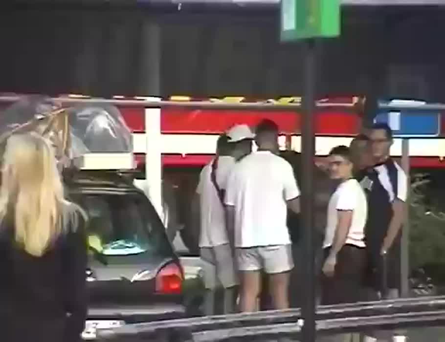 Kelly asking a group of guys if they want a blowjob