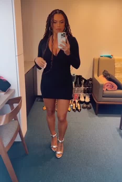Joy in short black dress 