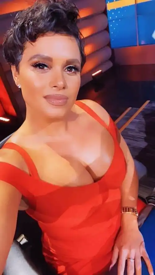 Joy Taylor in red dress
