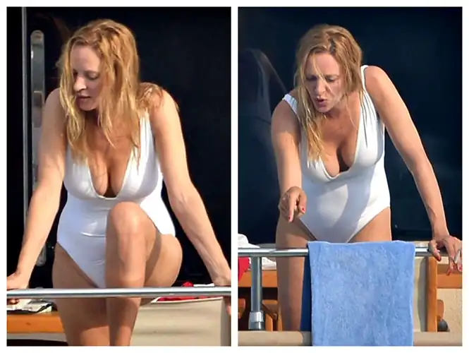 Busty queen Uma in Europe at Saint-Tropez in 2013. Her breast is almost coming out the cleavage!