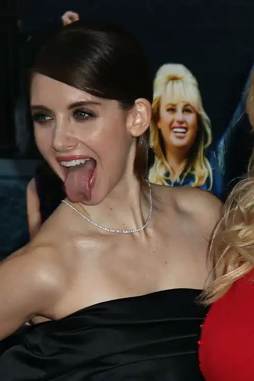 Sticking her tongue out
