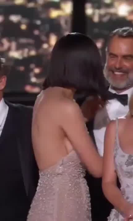 Alex on Stage at the Emmy's After The White Lotus Win