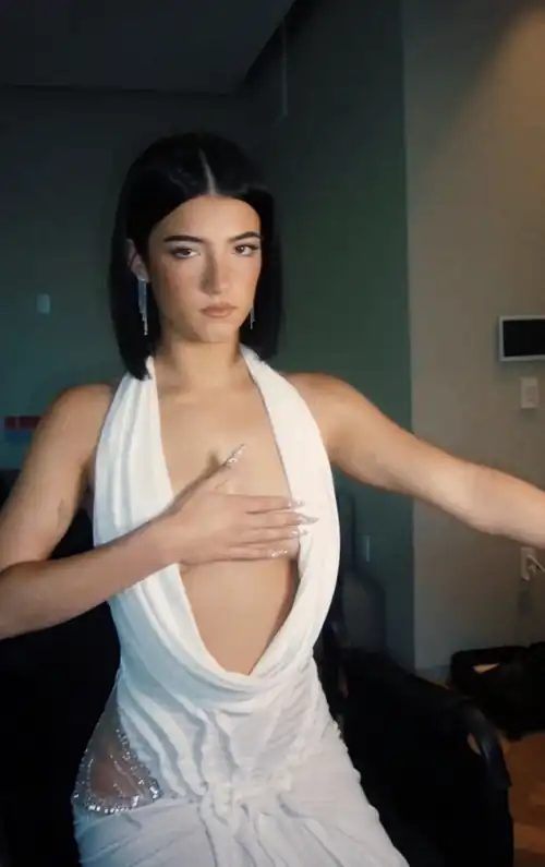 Your sister charli catches you looking at her tits and covers them. What do you say for her to uncover them 