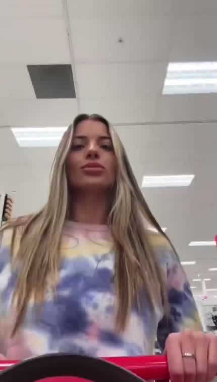 Shopping. Pierced huge tit reveal while shopping..