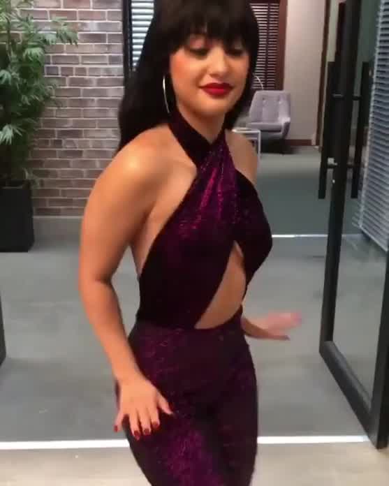 Shaking it dressed as Selena.