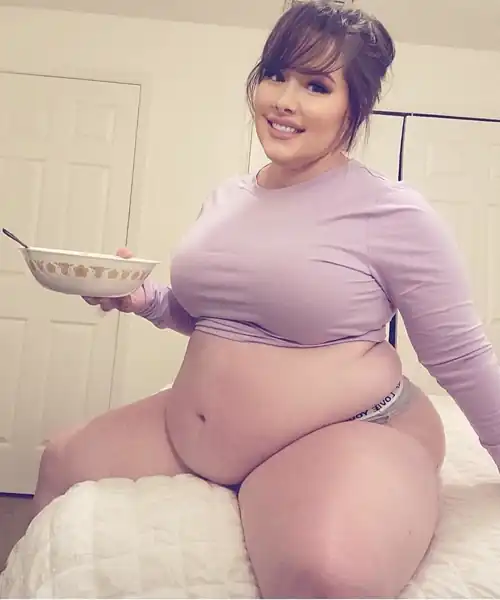 My belly's officially touching the bed when I sit