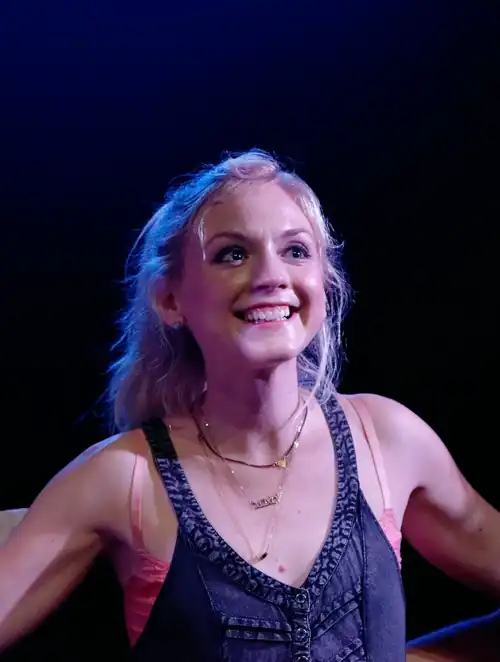 Emily smiling on stage