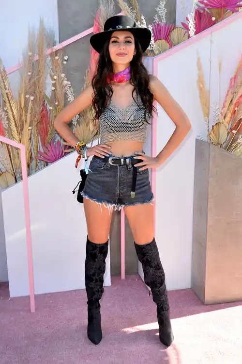 Victoria Justice Rocks Denim Shorts and Thigh-High Boots at the Revolve Festival, Coachella in Indio, California (April 13, 2019)