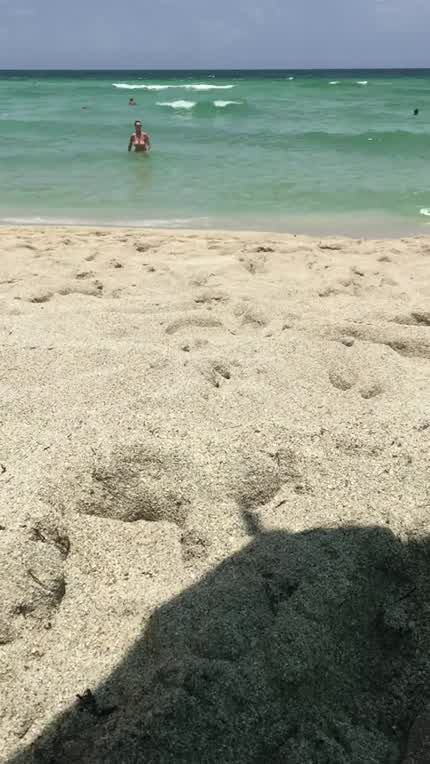 She makes me so proud! My 52yr old wife Kathy making sure several guys are looking at her before she walks out of the water at Haulover. 🌴Katherine Brown🌴